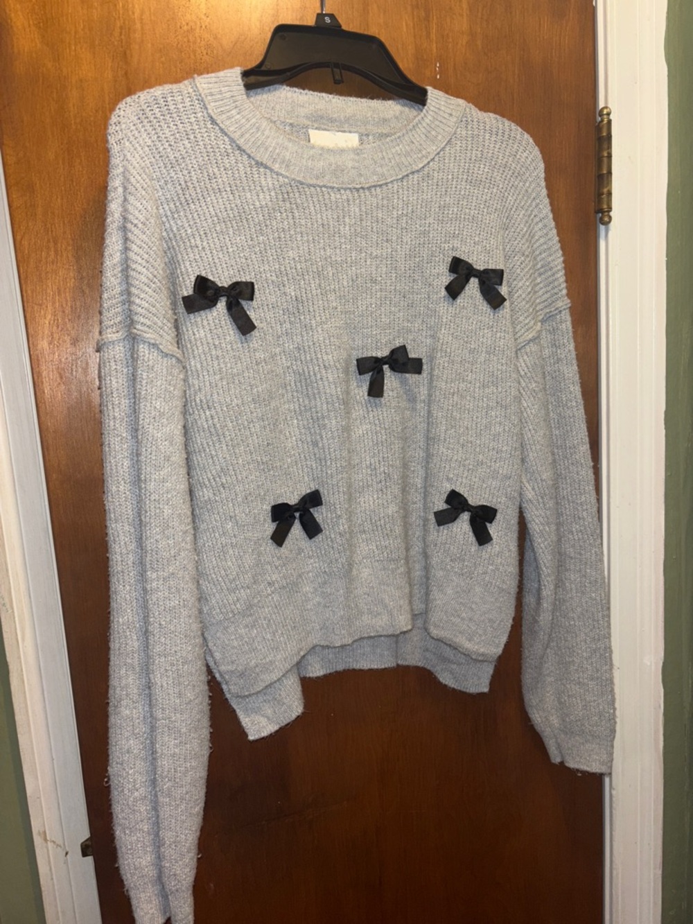 Pink Rose Light Gray Crewneck Sweater with Black Bow Appliqués